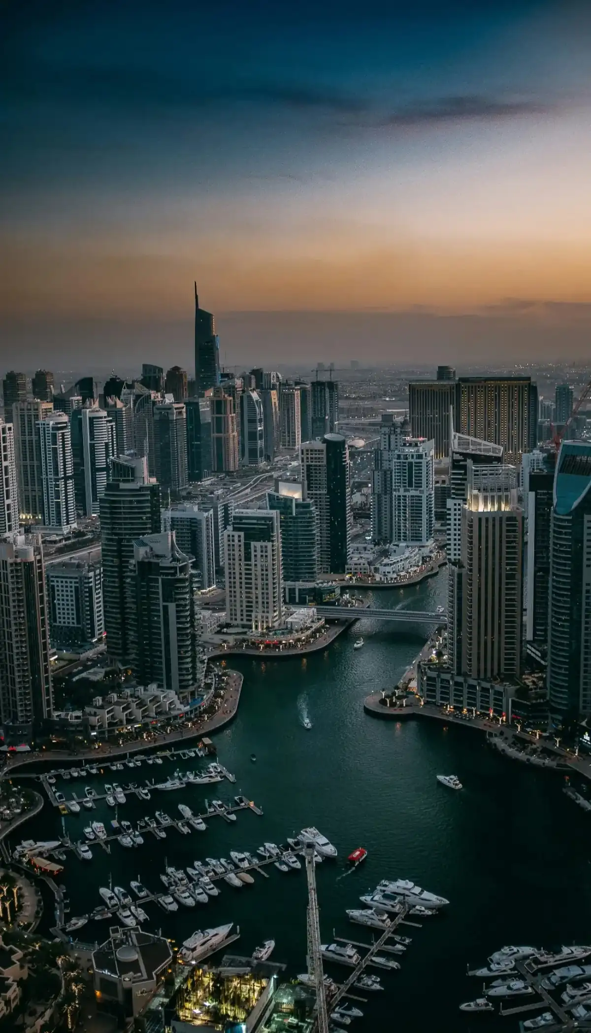 Dubai Marina at dusk — the tight social and business circle UAE high-net-worth residents step away from when choosing oceanfront alcohol rehab in Tulum