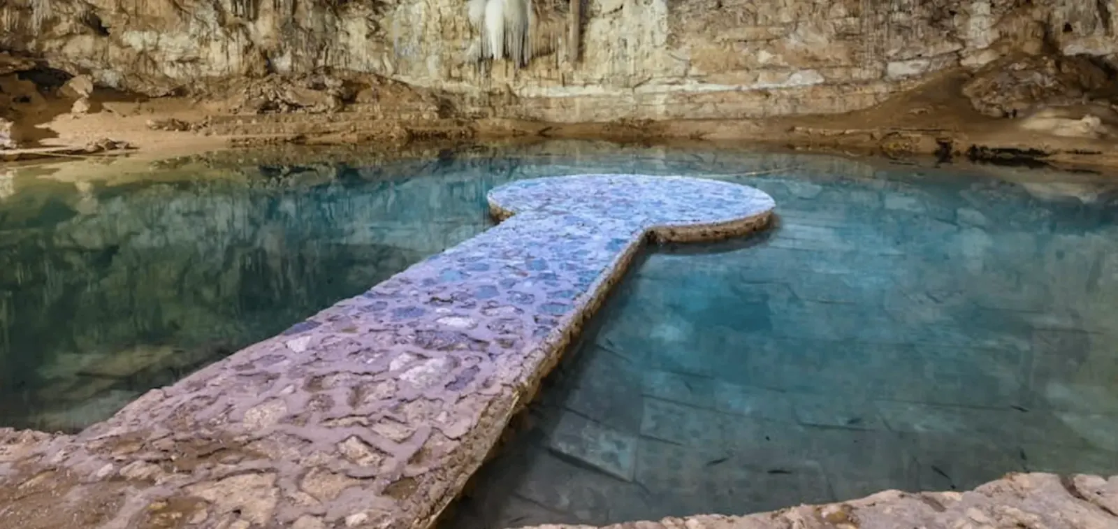 Turquoise cenote water used for cold immersion practice at Sanctuary Tulum